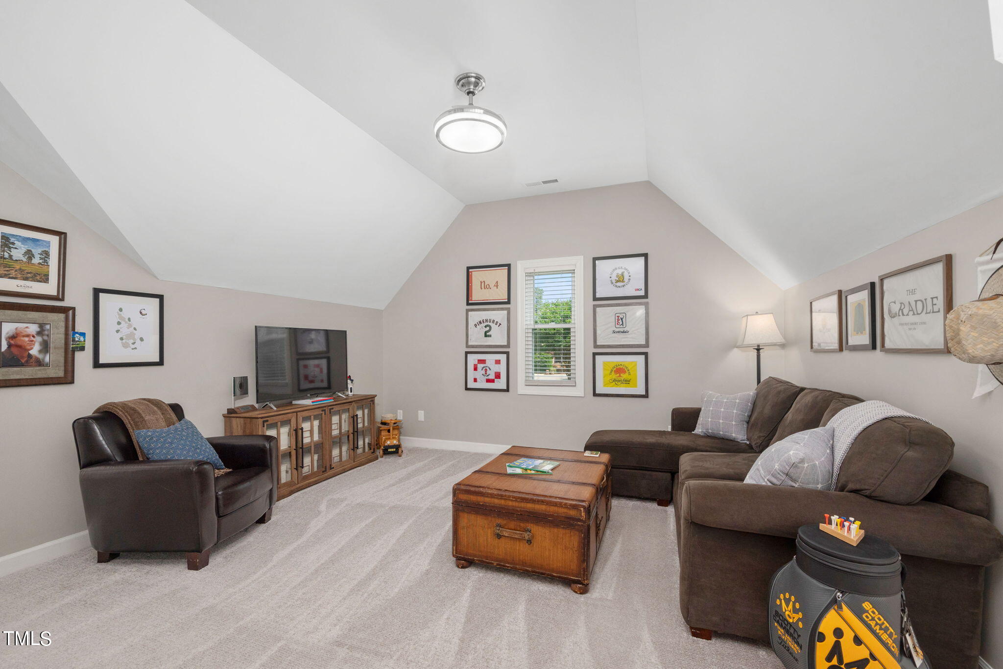 300 Pond Bluff Way Cary, NC 27513 - Photo 36 of 73 a bedroom with furniture and a flat screen tv