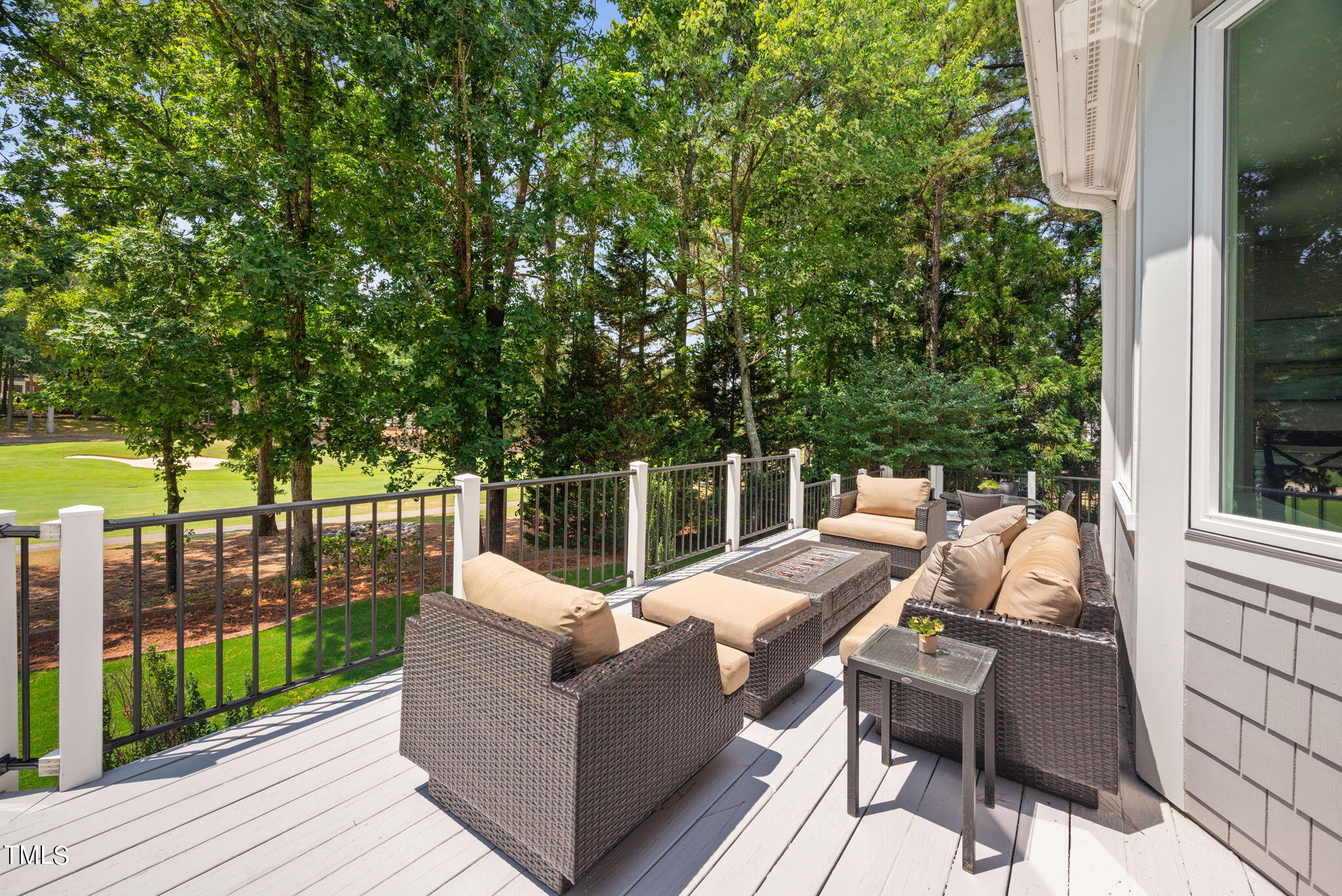 300 Pond Bluff Way Cary, NC 27513 - Photo 45 of 73 a view of a patio with couches chairs and wooden floor