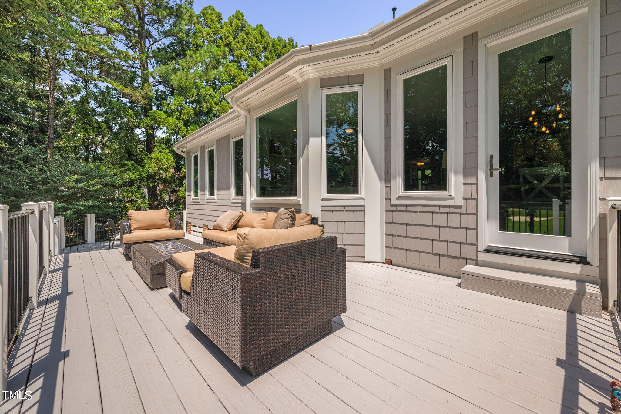 300 Pond Bluff Way Cary, NC 27513 - Photo 46 of 73 a view of a house with backyard sitting area and porch