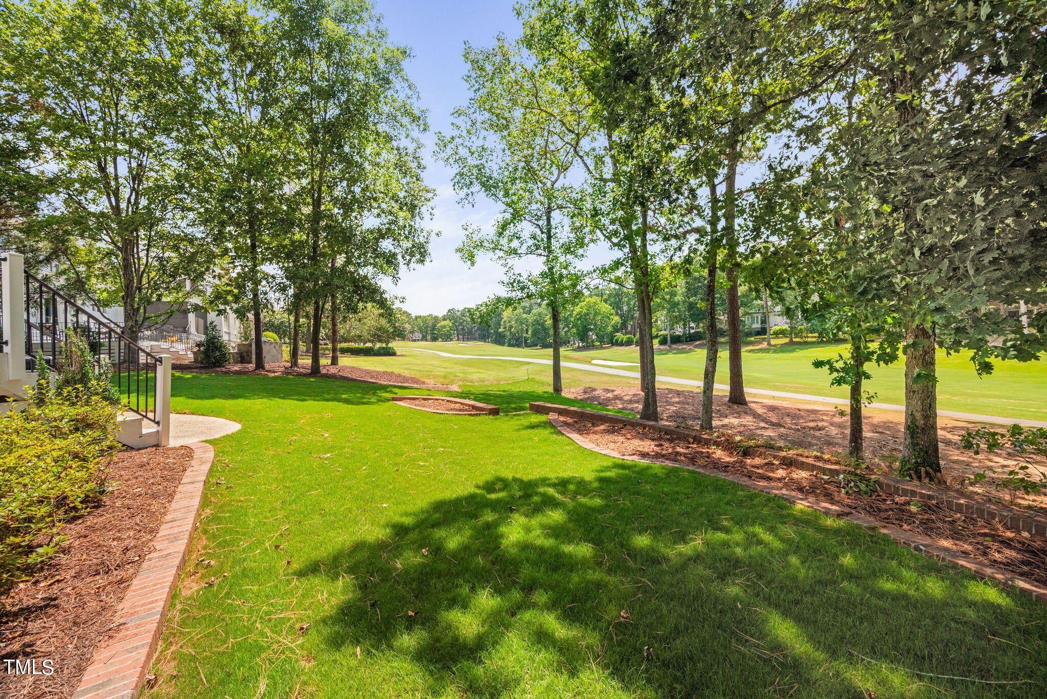 300 Pond Bluff Way Cary, NC 27513 - Photo 57 of 73 a view of a yard with palm trees