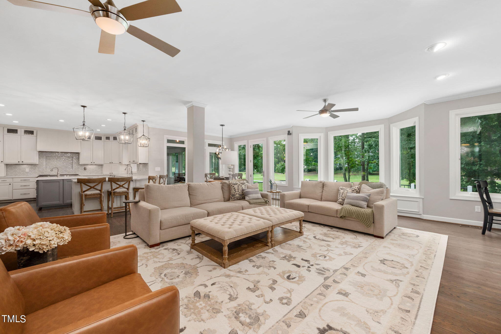 300 Pond Bluff Way Cary, NC 27513 - Photo 6 of 73 a living room with furniture and a large window