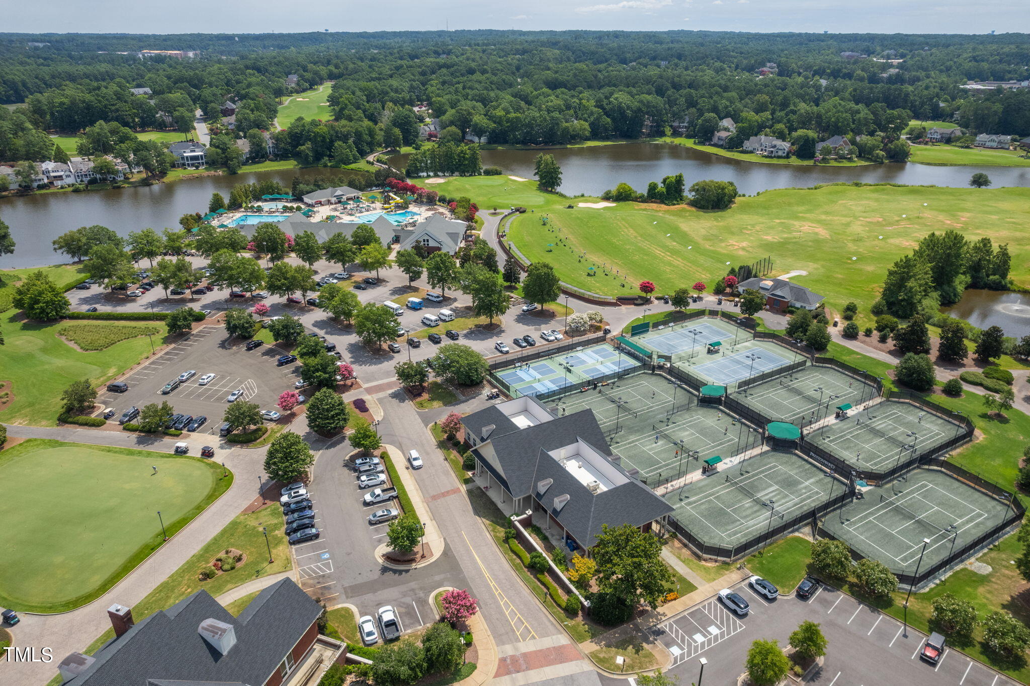 300 Pond Bluff Way Cary, NC 27513 - Photo 67 of 73 an aerial view of a city with lots of residential buildings