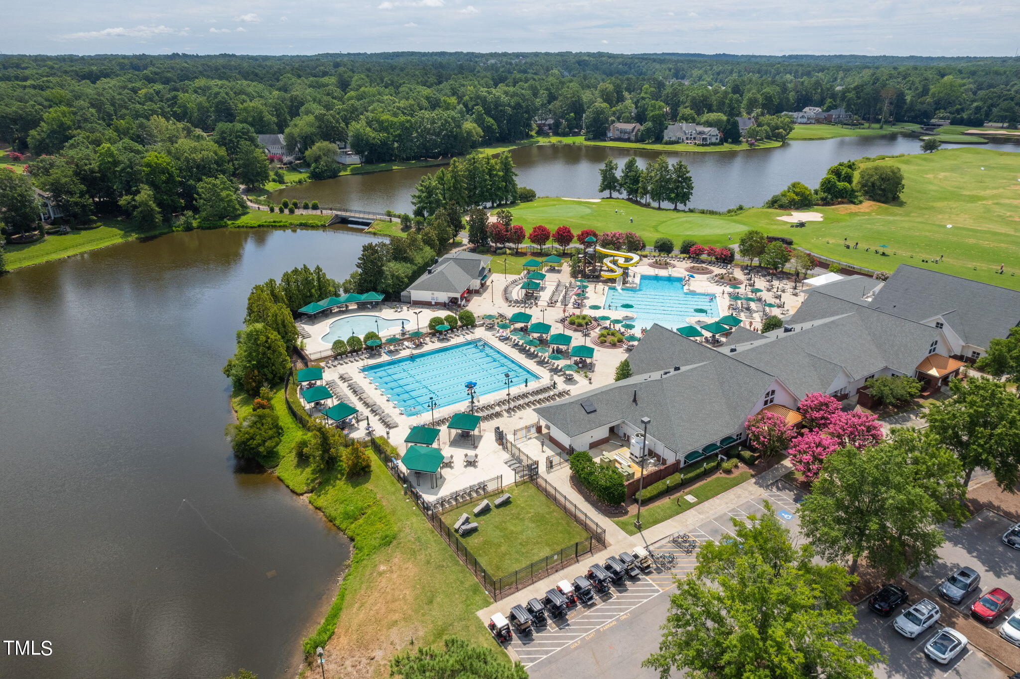 300 Pond Bluff Way Cary, NC 27513 - Photo 70 of 73 an aerial view of a house with a lake view