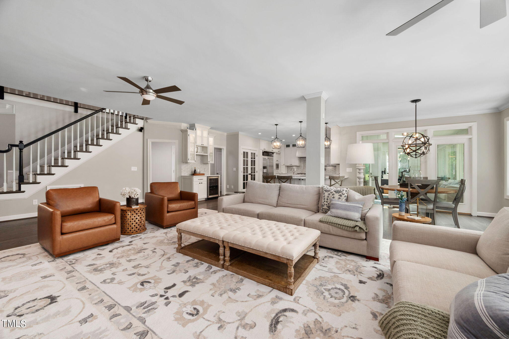 300 Pond Bluff Way Cary, NC 27513 - Photo 7 of 73 a living room with furniture ceiling fan and a rug