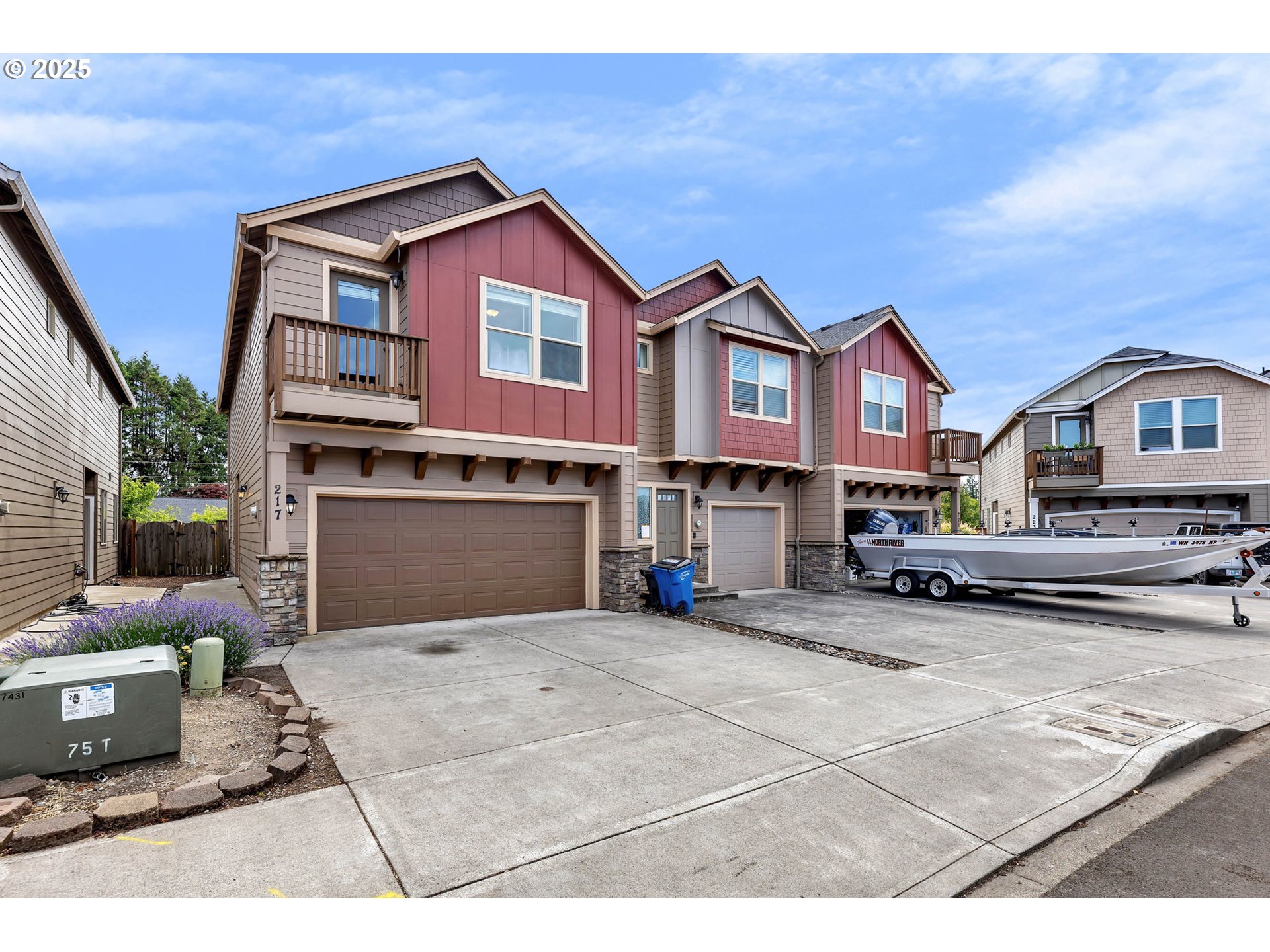 217 North 33rd Court Ridgefield, WA 98642 - Photo 1 of 35 a view of a house with couches and wooden fence