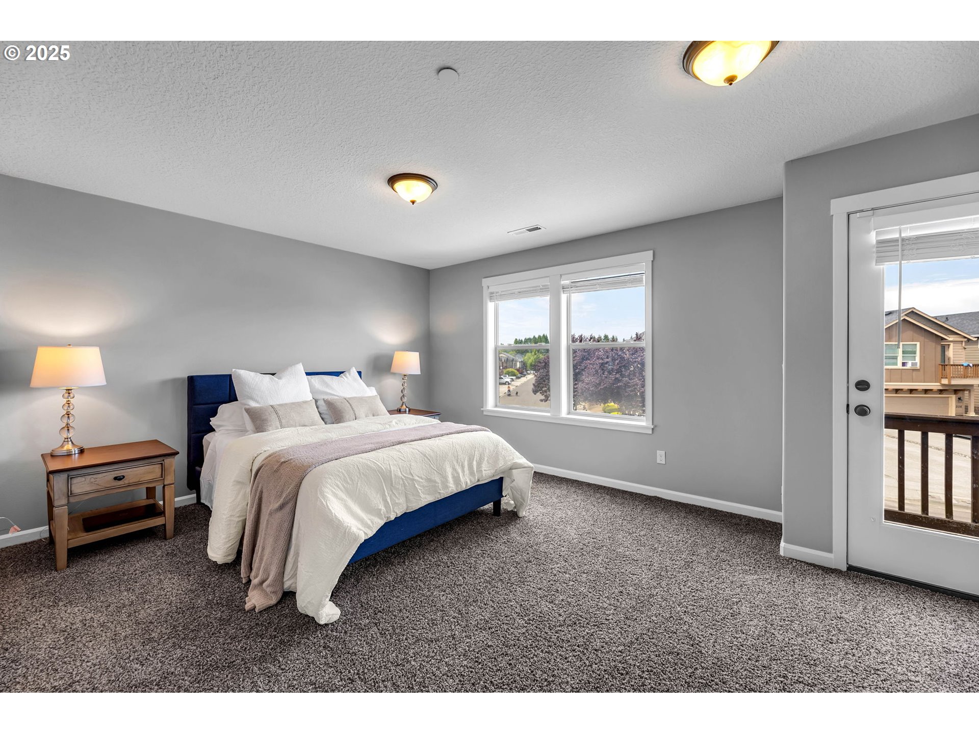 217 North 33rd Court Ridgefield, WA 98642 - Photo 25 of 35 a bedroom with a bed and a window