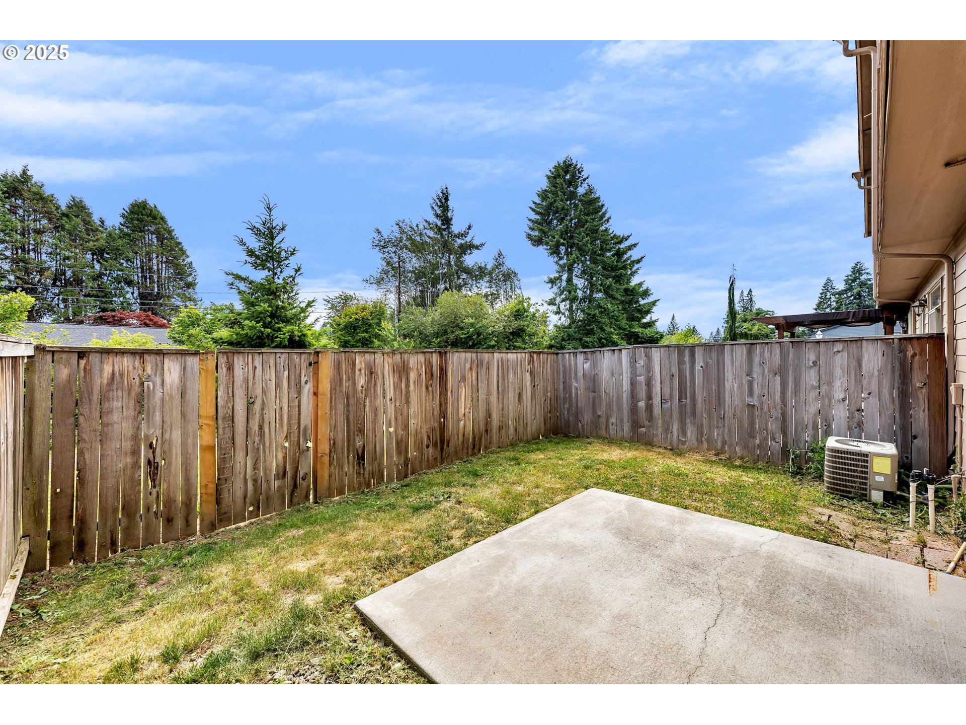 217 North 33rd Court Ridgefield, WA 98642 - Photo 33 of 35 a backyard of a house with lots of green space