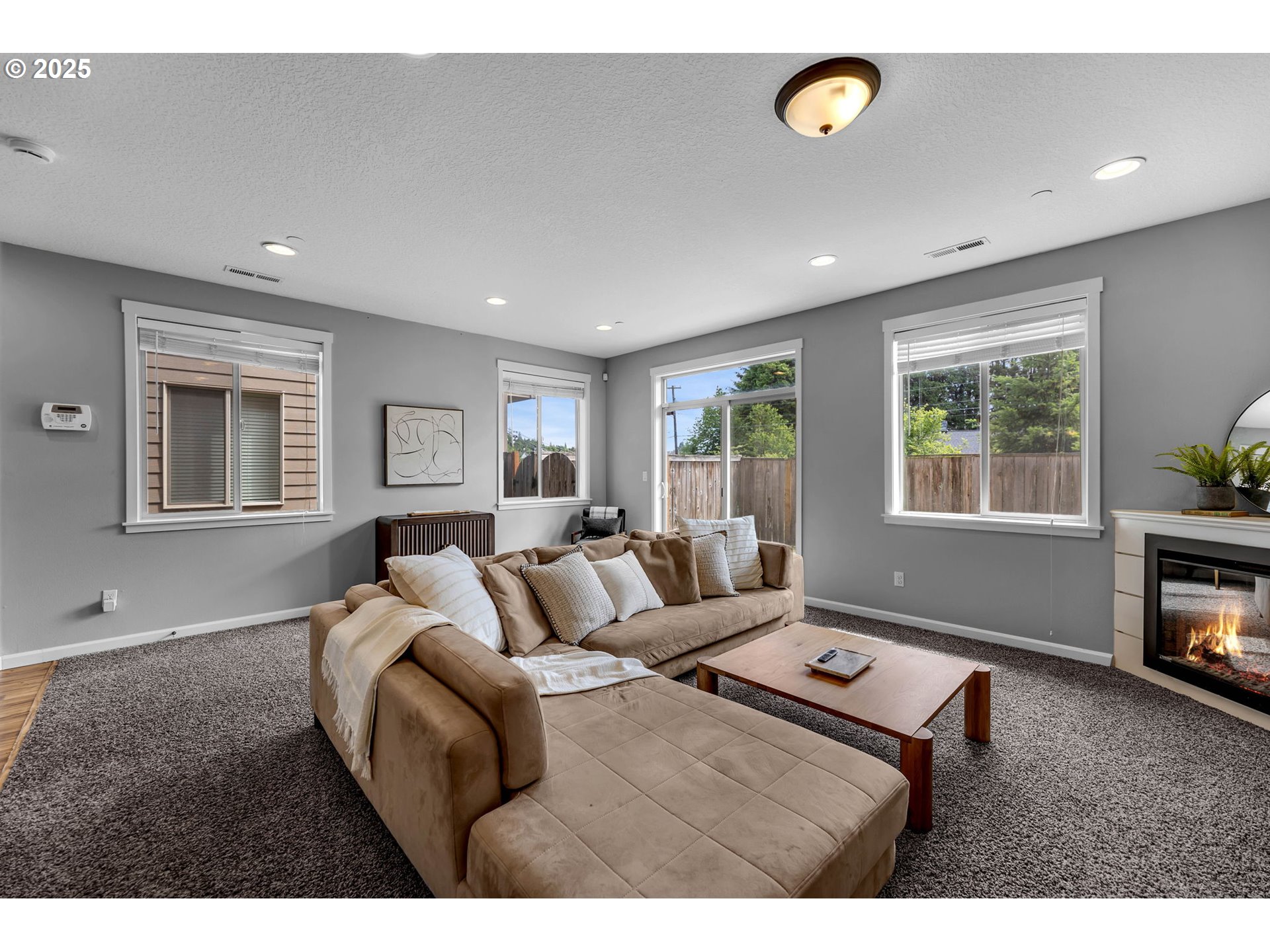 217 North 33rd Court Ridgefield, WA 98642 - Photo 7 of 35 a living room with furniture and a window