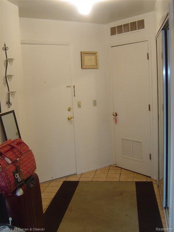 4682 East 10 Mile Road, Unit 12 Warren, MI 48091 - Photo 2 of 16 TILED FOYER