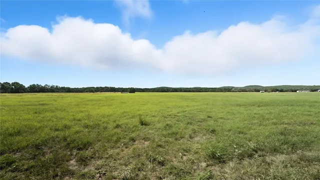 a view of a lake and mountain in the back