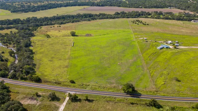 a view of a swimming pool and an outdoor space