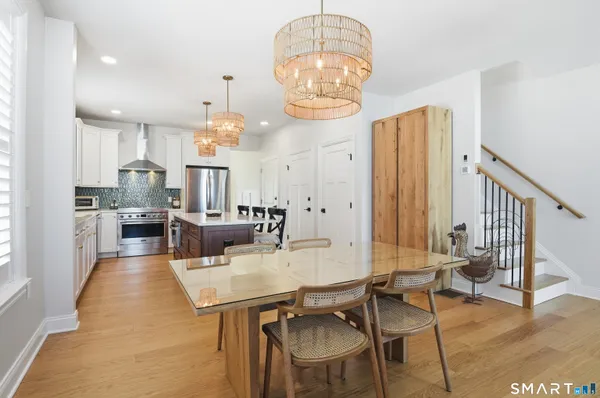 a view of a dining room with furniture