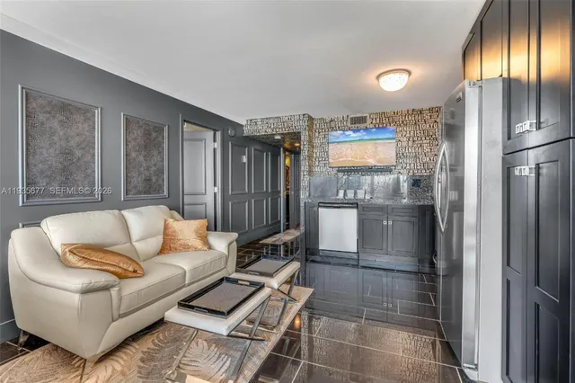 a bedroom with bed and glass door