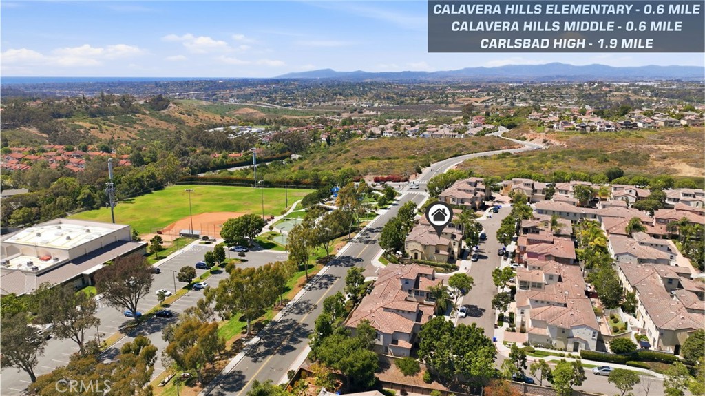 3603 Jetty Carlsbad, CA 92010 - Photo 37 of 43 an aerial view of residential building with parking space