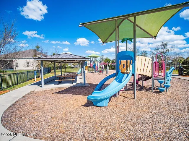 a view of a park with slide