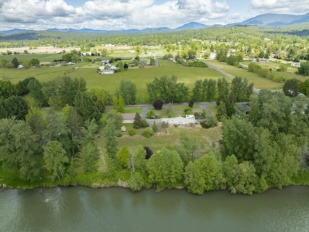 0 Lower River Road, Unit TL#108 Grants Pass, OR 97526 - Photo 39 of 47 a view of a lake with a city