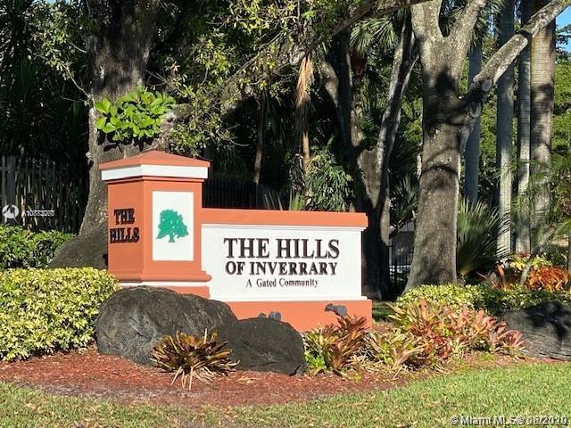 a sign on the side of a road