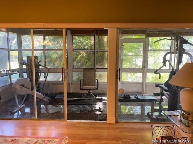 3448 Spring Bluff Place, Unit 27 Lauderhill, FL 33319 - Photo 13 of 24 a living room filled with furniture