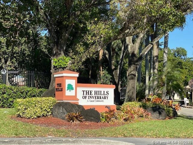 3448 Spring Bluff Place, Unit 27 Lauderhill, FL 33319 - Photo 23 of 24 a view of a park that has large trees