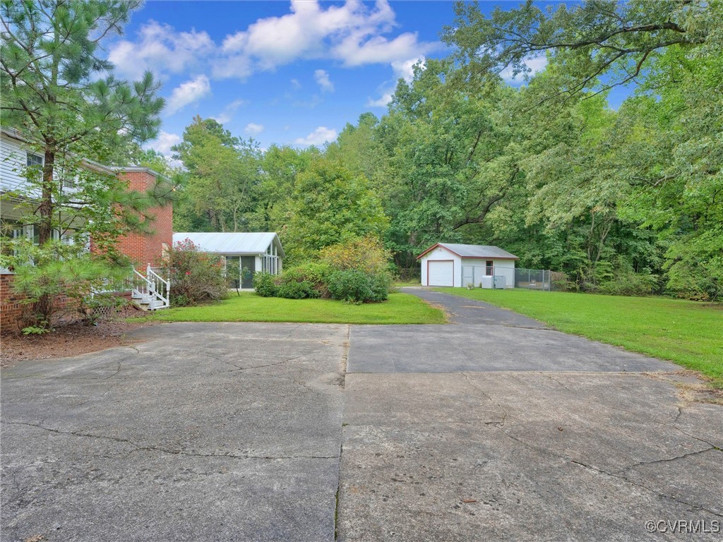 8901 Strath Road Henrico, VA 23231 - Photo 13 of 47 Ranch-style house with an outdoor structure, a gar