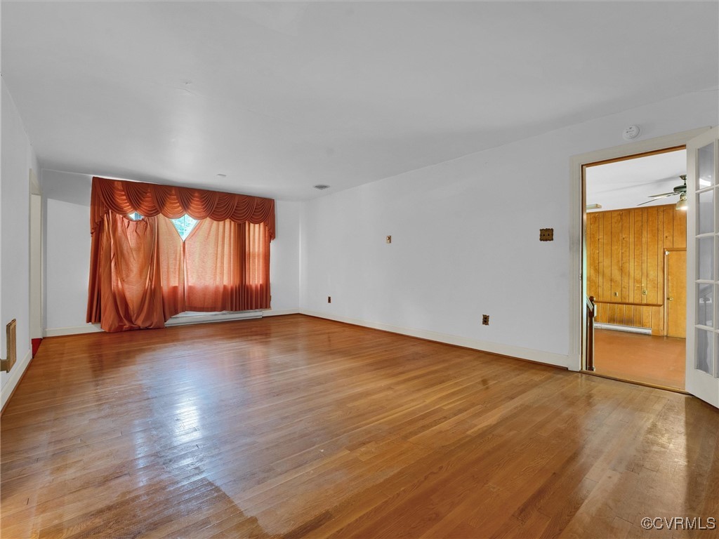 8901 Strath Road Henrico, VA 23231 - Photo 31 of 47 Unfurnished room with ceiling fan and hardwood / w