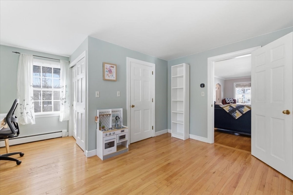 46 Park Street Dedham, MA 02026 - Photo 13 of 35 a view of a livingroom with a furniture and a window