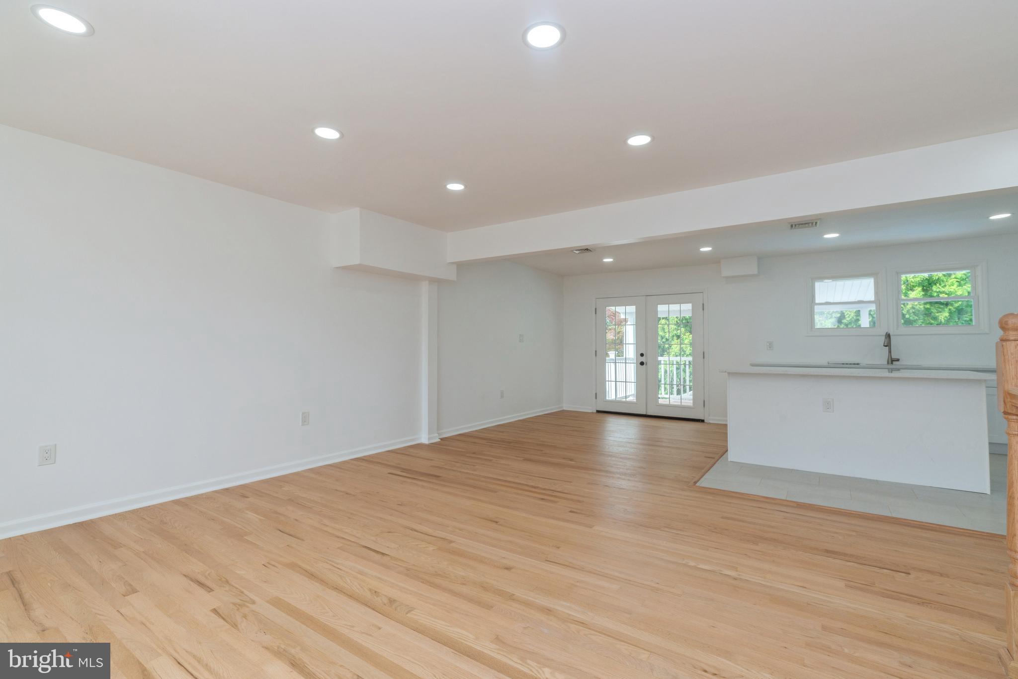 1150 Sharp Road Vineland, NJ 08360 - Photo 5 of 25 a view of empty room with wooden floor and fan