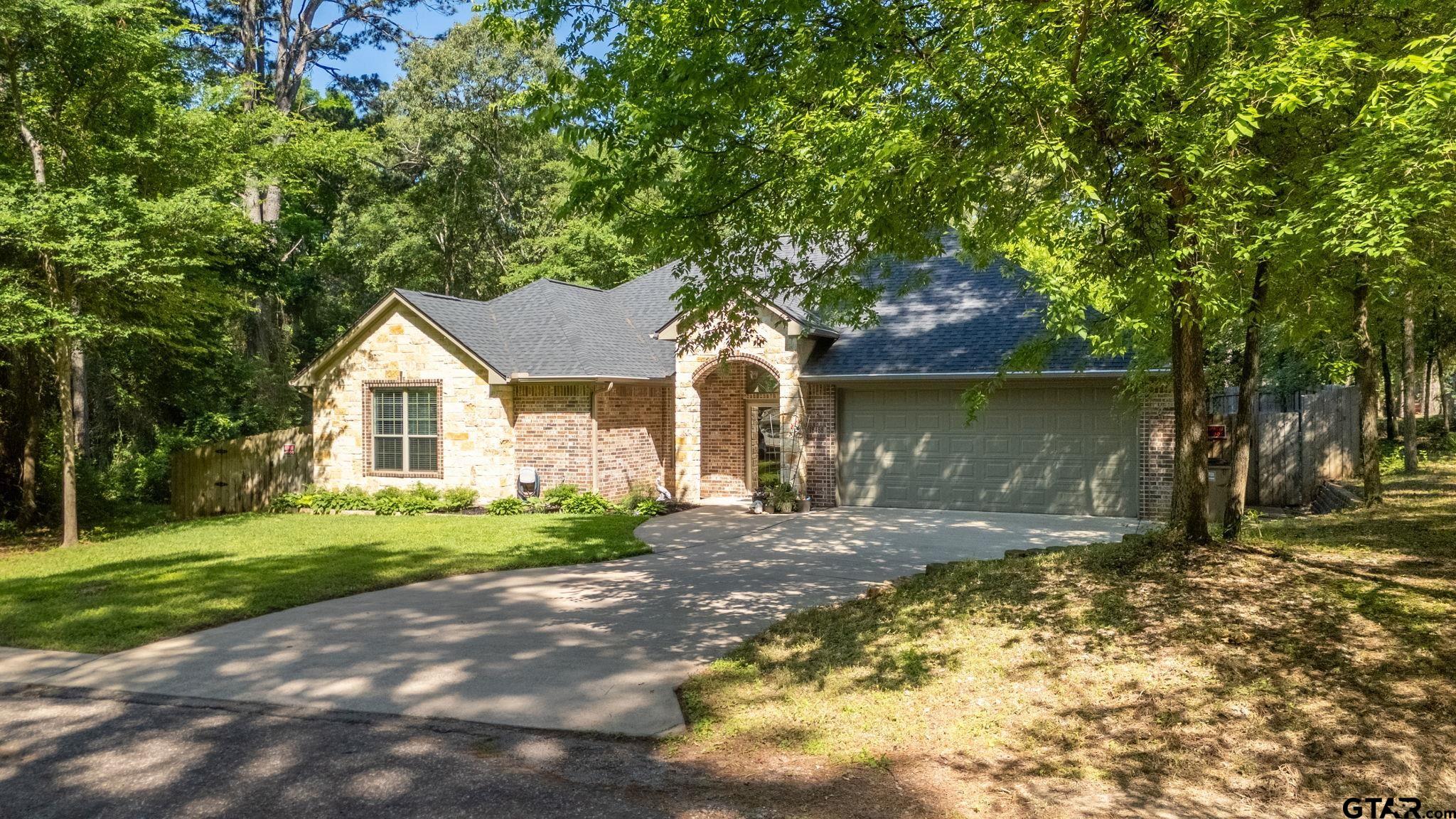 18488 Bluebird Circle Flint, TX 75762 - Photo 46 of 47 a house with a tree in front of it