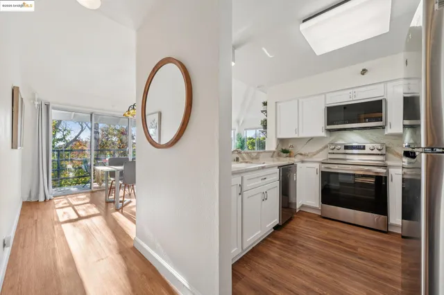 a kitchen with a sink and refrigerator