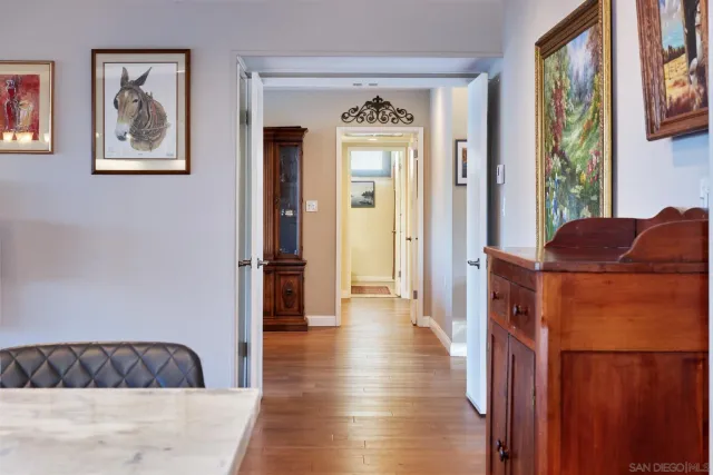 a living room with furniture and a gate