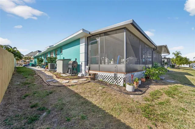 a front view of a house with outdoor seating