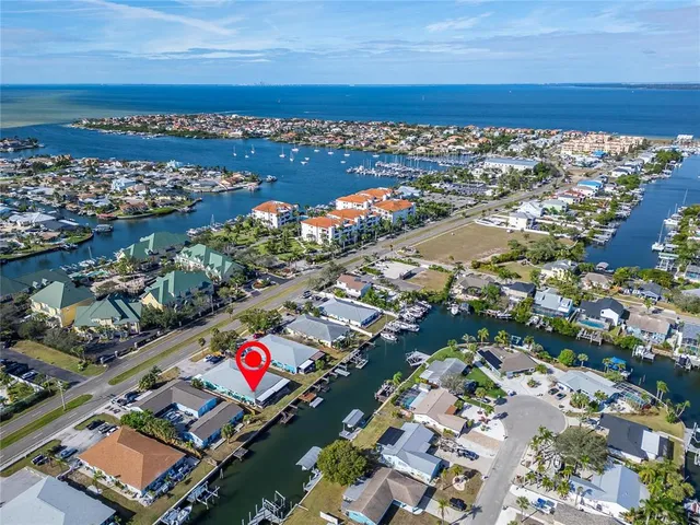 a view of a house with swimming pool and porch