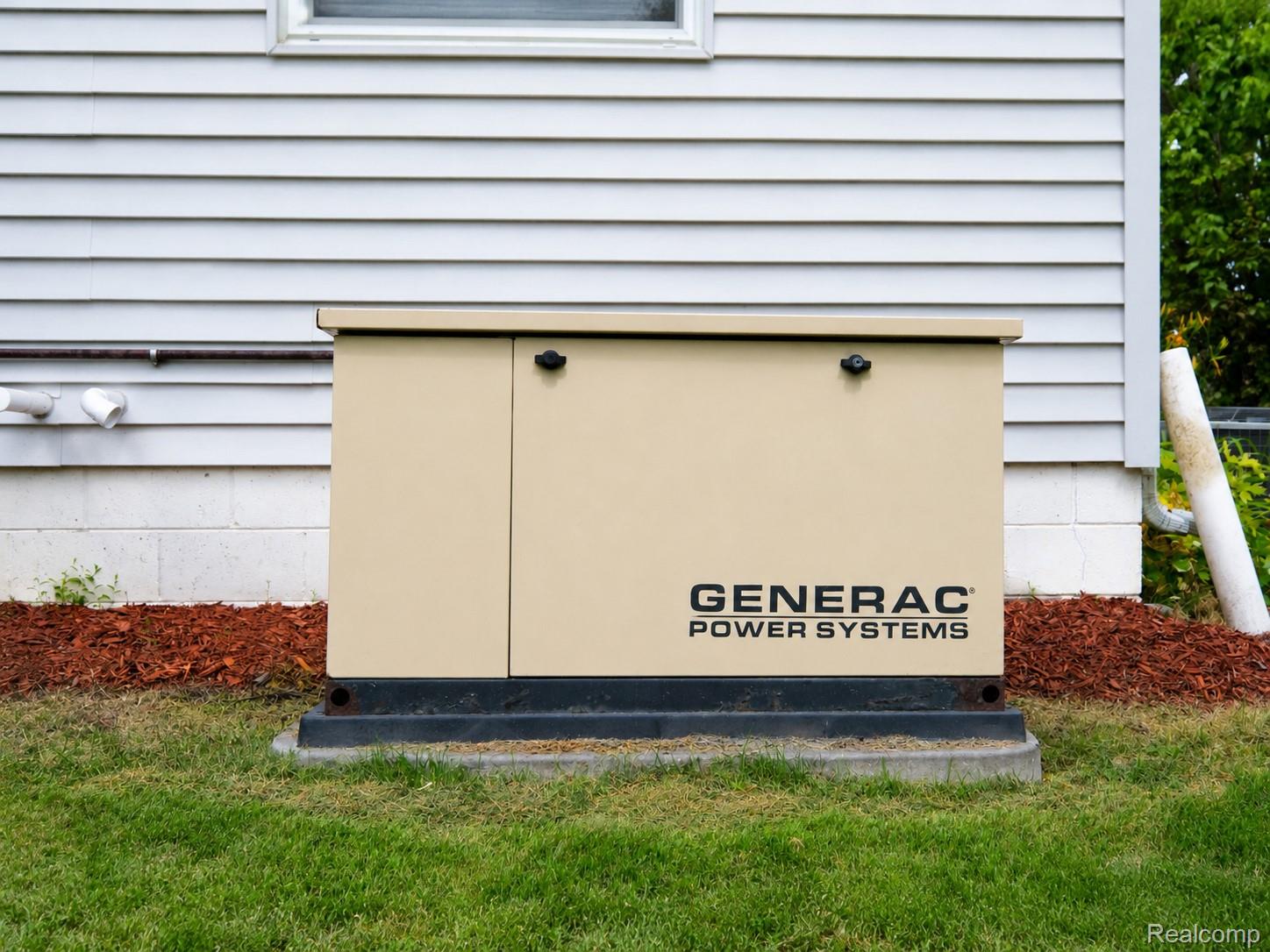 11399 Markley Road Gaines, MI 48436 - Photo 13 of 19 Generac Power Systems standby generator on a concrete pad