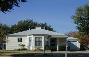 924 South Rusk Street Amarillo, TX 79102 - Photo 1 of 1 a front view of a house with a garden