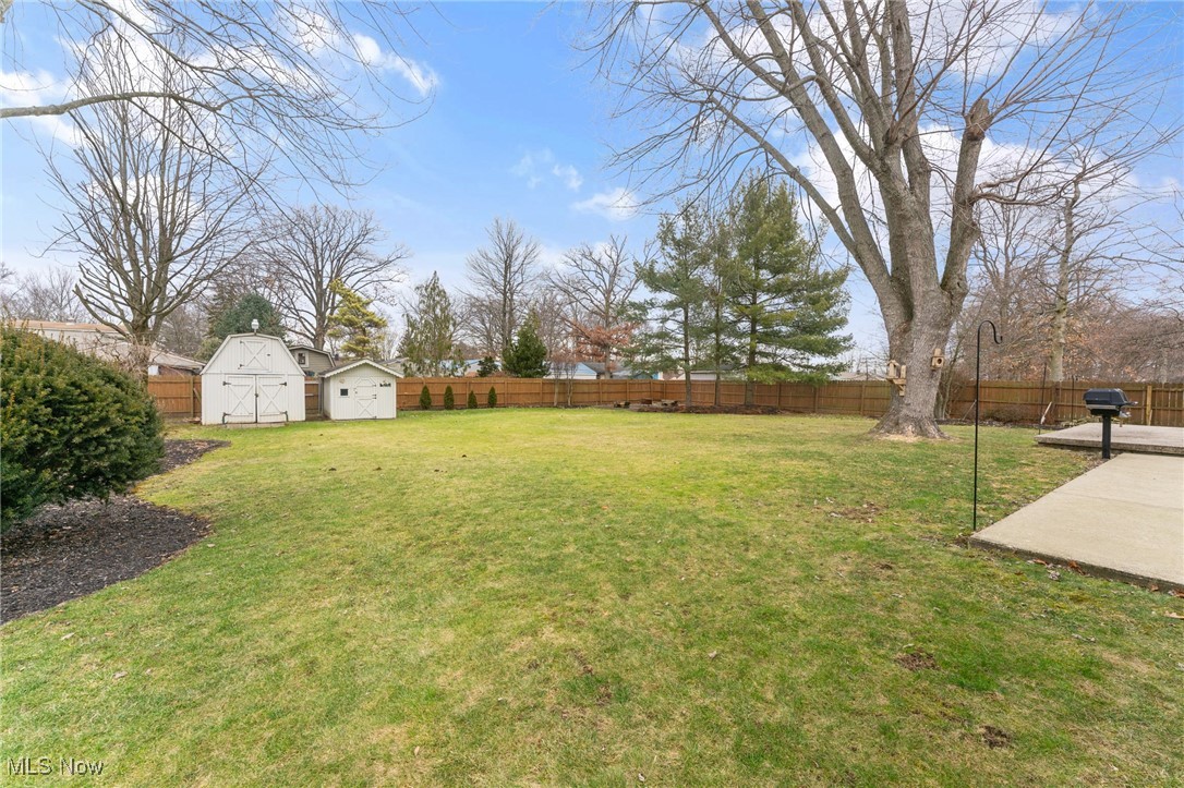 3314 Decamp Road Youngstown, OH 44511 - Photo 14 of 31 View of yard featuring a patio and a shed