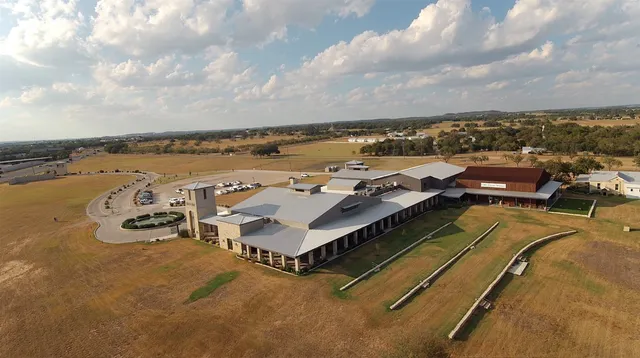 an aerial view of ocean and residential houses