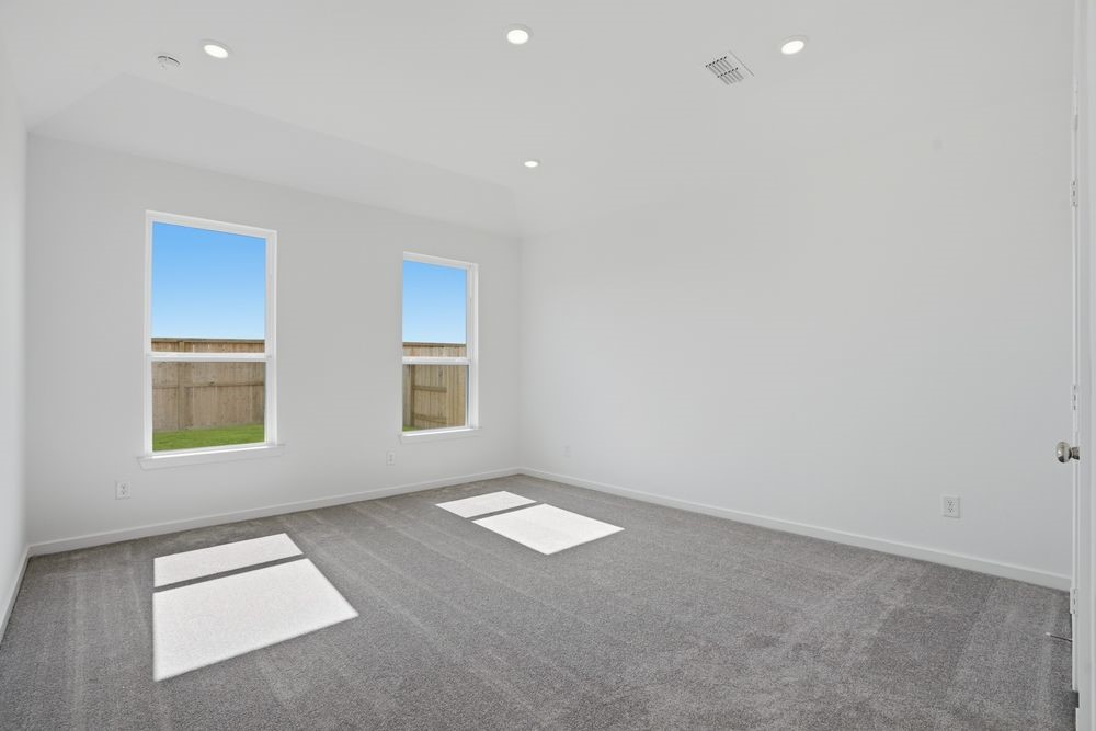 22123 Rangemore Drive Cypress, TX 77433 - Photo 11 of 34 an empty room with windows