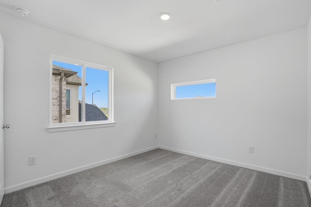 22123 Rangemore Drive Cypress, TX 77433 - Photo 16 of 34 an empty room with a window