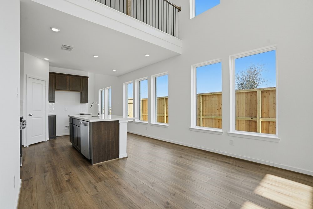 22123 Rangemore Drive Cypress, TX 77433 - Photo 3 of 34 a view of kitchen with windows and refrigerator