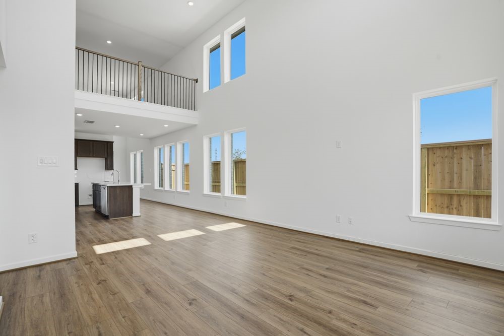 22123 Rangemore Drive Cypress, TX 77433 - Photo 7 of 34 a view of a living room with wooden floor