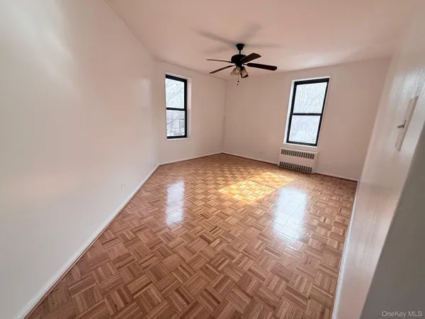 a view of empty room with windows