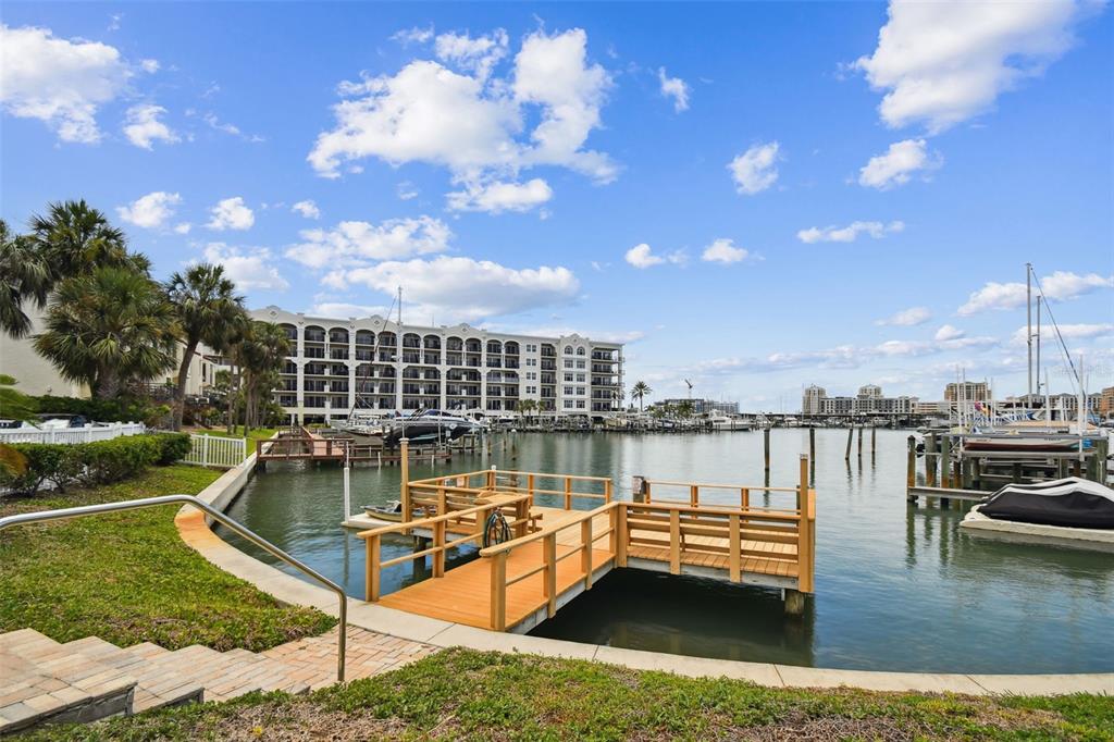 255 Dolphin Point, Unit 207 Clearwater Beach, FL 33767 - Photo 43 of 69 a view of a lake with a terrace