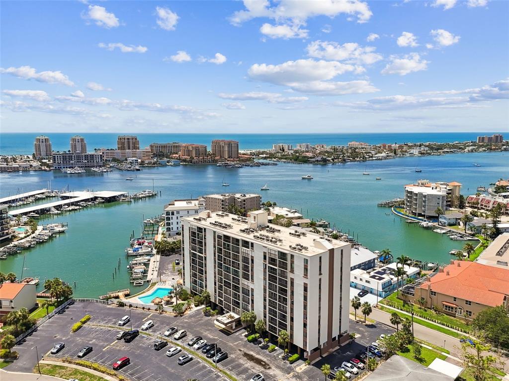 255 Dolphin Point, Unit 207 Clearwater Beach, FL 33767 - Photo 50 of 69 a view of a lake with a terrace