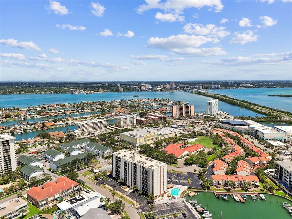 255 Dolphin Point, Unit 207 Clearwater Beach, FL 33767 - Photo 54 of 69 an aerial view of a house with a lake view