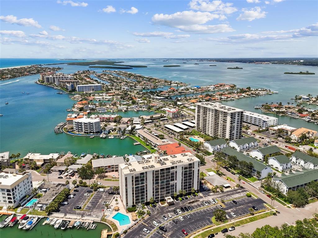 255 Dolphin Point, Unit 207 Clearwater Beach, FL 33767 - Photo 56 of 69 a view of a city and lake