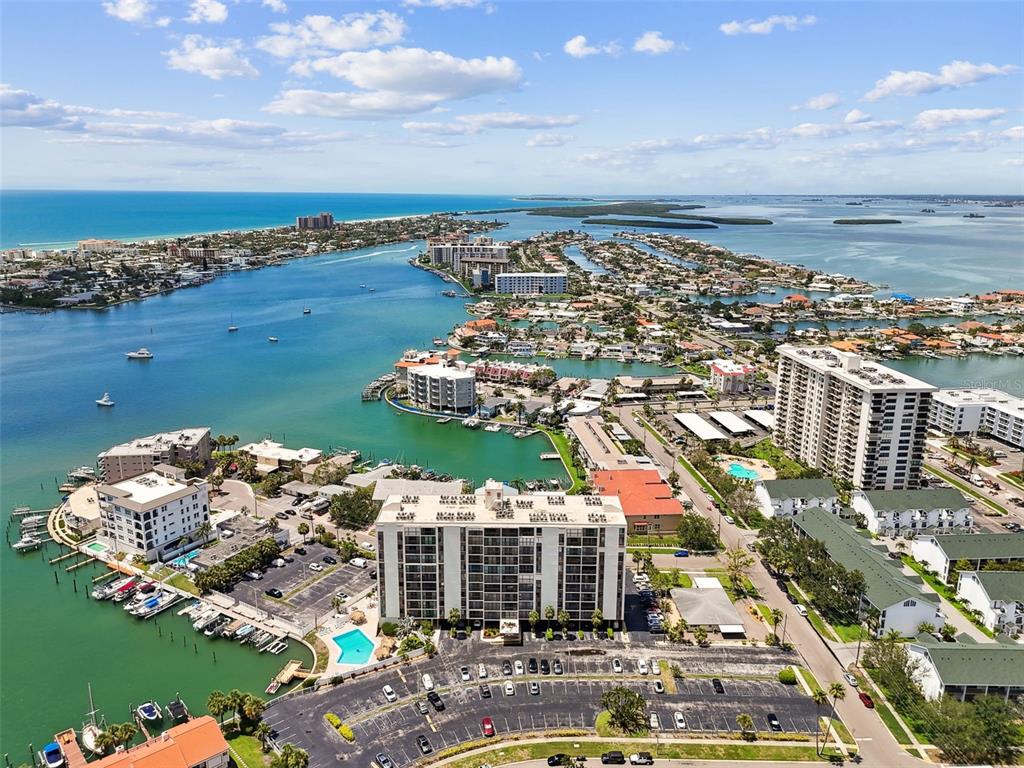 255 Dolphin Point, Unit 207 Clearwater Beach, FL 33767 - Photo 57 of 69 a view of a city with an ocean view