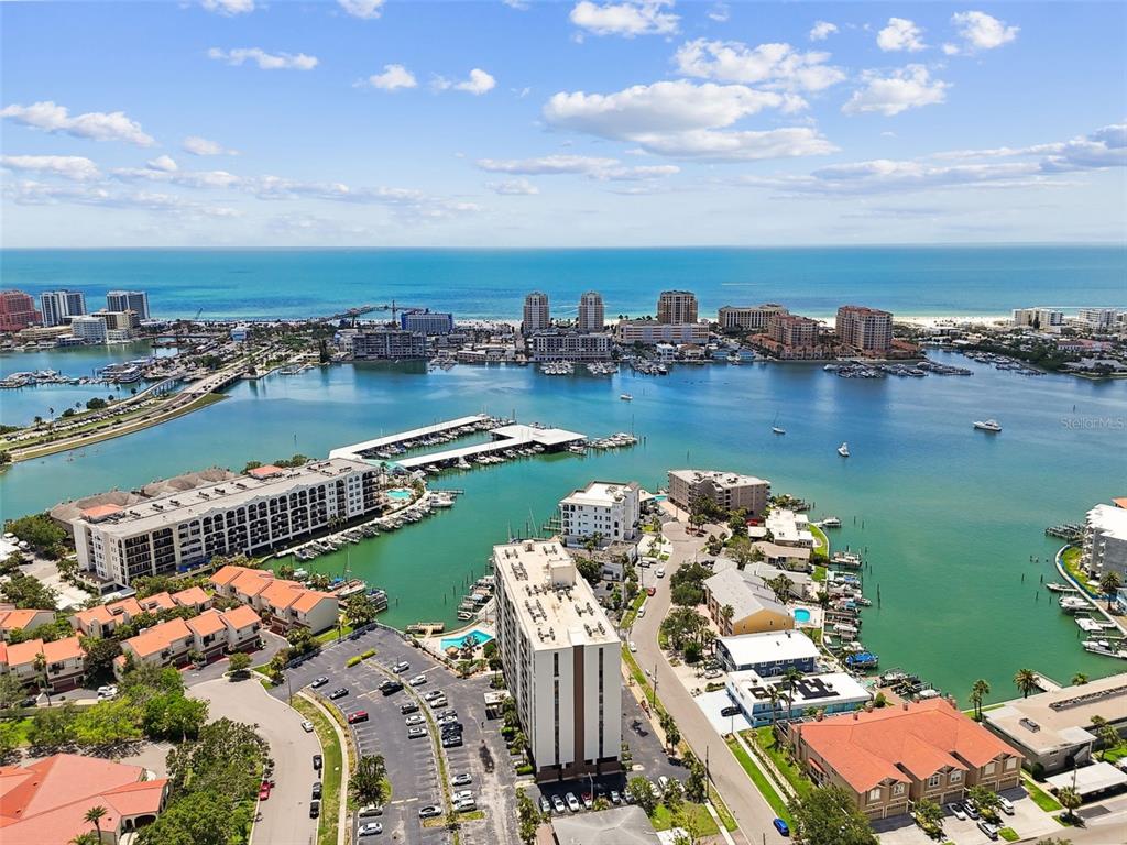 255 Dolphin Point, Unit 207 Clearwater Beach, FL 33767 - Photo 58 of 69 aerial view of a city