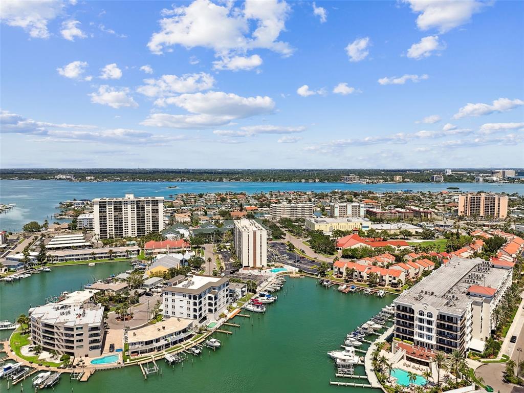 255 Dolphin Point, Unit 207 Clearwater Beach, FL 33767 - Photo 63 of 69 a view of a lake with a city view