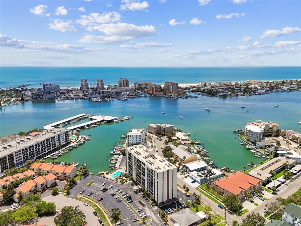 255 Dolphin Point, Unit 207 Clearwater Beach, FL 33767 - Photo 69 of 69 a view of a lake with outdoor space
