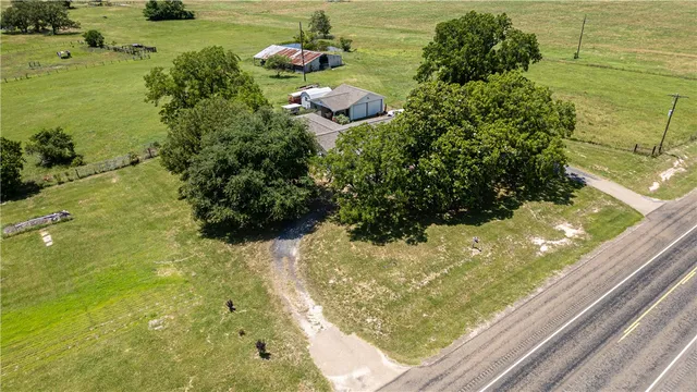 a view of a garden with a lake